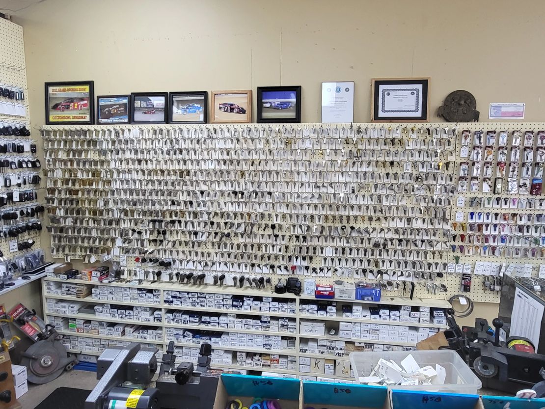 Organized wall of locksmith key blanks and tags